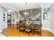 Bright dining room with hardwood floors and view of living room at 1068 Blockade Runner Pkwy, Summerville, SC 29485