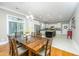 Spacious dining room with hardwood floors and kitchen access at 1068 Blockade Runner Pkwy, Summerville, SC 29485