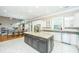 Open concept kitchen boasts granite countertops, white cabinets, and a large island at 1068 Blockade Runner Pkwy, Summerville, SC 29485