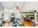 Vaulted ceilings and open floor plan living room with kitchen view at 1068 Blockade Runner Pkwy, Summerville, SC 29485