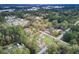 Aerial view of a house surrounded by lush green trees at 113 Hill Drive, Summerville, SC 29483