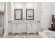 Double vanity bathroom with marble countertop at 128 Beresford Creek St, Charleston, SC 29492