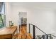 Upper hallway with wood desk and bookcase at 128 Beresford Creek St, Charleston, SC 29492