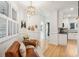 White kitchen with granite countertops and stainless steel appliances at 128 Beresford Creek St, Charleston, SC 29492