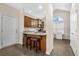 Kitchen with granite countertops, wood cabinets, and breakfast bar at 129 Buchanan Cir, Goose Creek, SC 29445