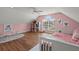 Charming bedroom with pink walls and toys at 1412 White Ibis Ct, Hanahan, SC 29410