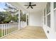 Spacious deck with white railings, overlooking a grassy yard at 1577 Periwinkle Dr, Mount Pleasant, SC 29466