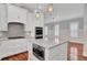 Modern kitchen with white cabinets, stainless steel appliances, and a built-in microwave at 1628 Ware Bottom Ln, Mount Pleasant, SC 29464