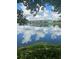 Stunning reflection of houses and clouds on the lake at 1781 Brittlebush Ln, Johns Island,  29455