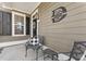 Front porch with black and white decor at 1850 Grovehurst Dr, Charleston,  29414