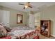 Serene bedroom with a queen-size bed, and built-in shelving at 19 23Rd Ave, Isle of Palms, SC 29451