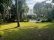 Private pool area surrounded by lush tropical landscaping at 19 23Rd Ave, Isle of Palms, SC 29451