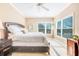 Comfortable bedroom with a queen bed and plenty of natural light at 1984 Folly Rd # B108, Charleston, SC 29412