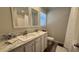 Double vanity bathroom with marble countertop and shower/tub combo at 208 General Moultrie Dr, Bonneau, SC 29431