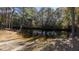 Community boat ramp nestled in a wooded area, providing access to a calm waterway at 208 General Moultrie Dr, Bonneau, SC 29431