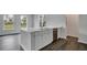 Kitchen island with white cabinets and quartz countertop at 209 Terrace View Dr, Summerville, SC 29486