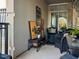 Cozy balcony with wicker furniture and eclectic decor at 221 S Plaza Ct # 107, Mount Pleasant, SC 29464