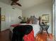 Cozy bedroom with queen-size bed and hardwood floors at 221 S Plaza Ct # 107, Mount Pleasant, SC 29464