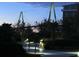 Community pool with illuminated bridge view at 221 S Plaza Ct # 107, Mount Pleasant, SC 29464