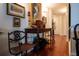 Bright hallway with hardwood floors and decorative console table at 221 S Plaza Ct # 107, Mount Pleasant, SC 29464