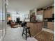 Open concept kitchen with island and living area at 221 S Plaza Ct # 107, Mount Pleasant, SC 29464