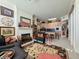 Open living room with fireplace and adjoining kitchen at 221 S Plaza Ct # 107, Mount Pleasant, SC 29464