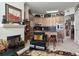 Living room with fireplace and view into kitchen at 221 S Plaza Ct # 107, Mount Pleasant, SC 29464