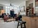 Open living room features a cozy seating area and hardwood floors at 221 S Plaza Ct # 107, Mount Pleasant, SC 29464