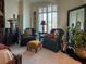 Relaxing sitting area in bedroom with two armchairs and ottoman at 221 S Plaza Ct # 107, Mount Pleasant, SC 29464