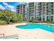 Enjoy this refreshing pool with plenty of surrounding lounge chairs at 221 S Plaza Ct # 107, Mount Pleasant, SC 29464
