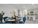 Dining area with dark wood table and blue velvet chairs at 221 Terrace View Dr, Summerville, SC 29486