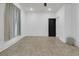 Empty basement room with tile floors and large window at 2777 Oak Manor Dr, Mount Pleasant, SC 29466