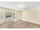 Spacious living room with bay window and neutral carpeting at 302 Chessington Cir, Summerville, SC 29485