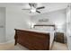 Main bedroom with a wooden sleigh bed and ceiling fan at 302 Salterton St, Summerville,  29485