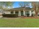 Ranch style home with green shutters and a welcoming porch at 302 Salterton St, Summerville,  29485