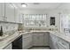 Modern kitchen with gray cabinets, granite countertops, and stainless steel appliances at 302 Salterton St, Summerville,  29485