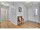 Bright entryway with hardwood floors and coat closet at 304 Wild Horse Ln, Mount Pleasant, SC 29464