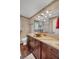 Bathroom boasts granite countertops, a copper sink, and updated fixtures at 317 W Hudson Ave, Folly Beach, SC 29439