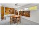 Bright dining area with built-in bookshelves and a wooden table set at 317 W Hudson Ave, Folly Beach, SC 29439
