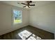 Well-lit bedroom with large window and wood-look floors at 413 Madeline Dr, Goose Creek, SC 29445