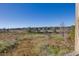 Expansive porch showcasing scenic marsh landscapes at 422 Pelican Flight Dr, Dewees Island, SC 29451