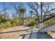 View of unpaved path leading through natural landscape at 422 Pelican Flight Dr, Dewees Island, SC 29451