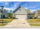 Attached garage with driveway at 422 Switchgrass Dr, Summerville, SC 29486