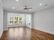 Bright living room with hardwood floors and ceiling fan at 422 Switchgrass Dr, Summerville, SC 29486