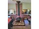 Mid-century modern fireplace with brick surround and seashell hearth at 4432 Logwood Dr, Ladson, SC 29456