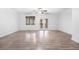 Bright living room featuring hardwood floors and patio access at 4538 Great Oak Dr # 4D, North Charleston, SC 29418