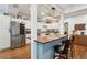 Modern kitchen with blue island, stainless steel appliances and hardwood floors at 5208 Holly Forest, Hollywood,  29449