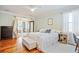 Bright and airy main bedroom with hardwood floors and sitting area at 5208 Holly Forest, Hollywood,  29449