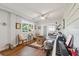 Sunroom with seating, piano, and wood floors at 5208 Holly Forest, Hollywood,  29449