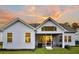 White house exterior, screened porch, sunset view at 522 Oak View Way, Summerville, SC 29483